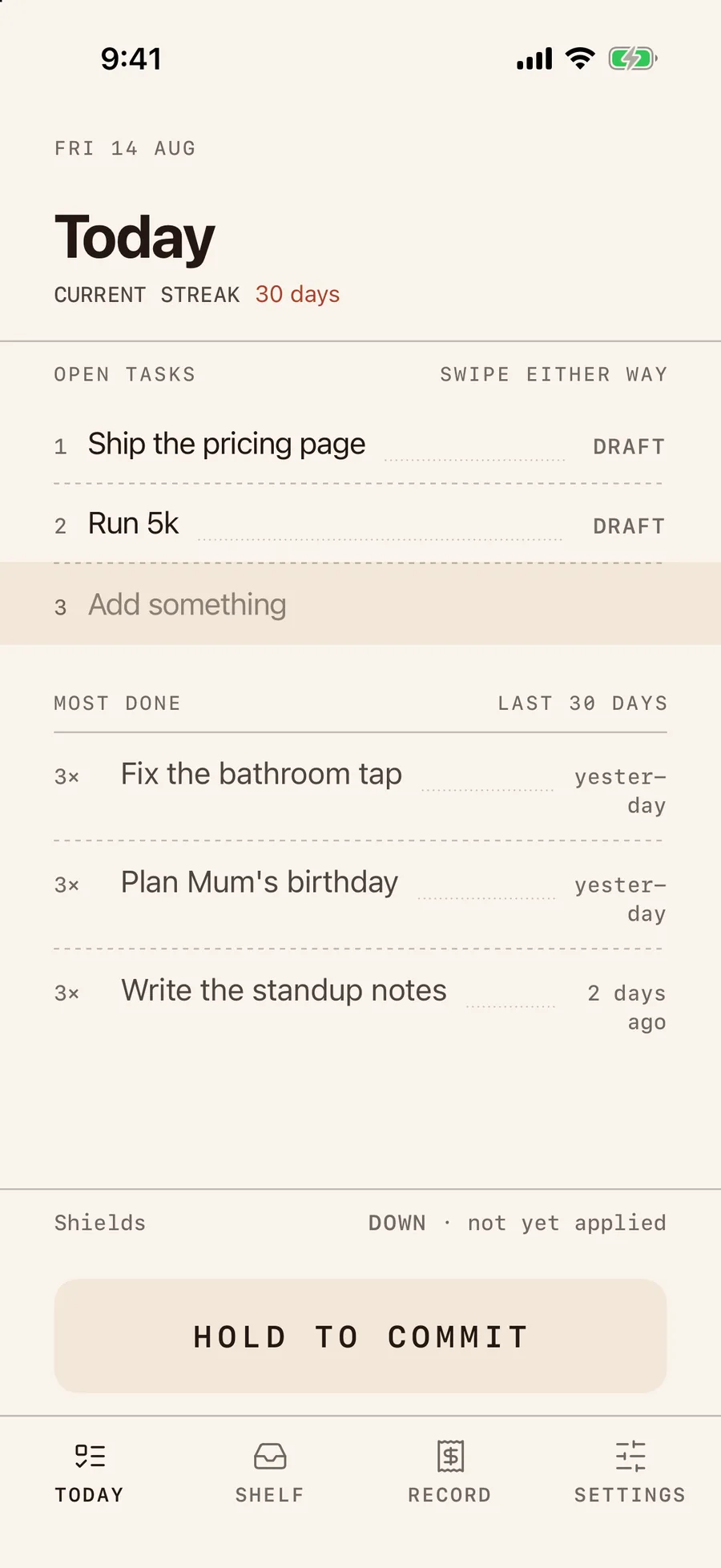 The Consigo Today screen while planning, dated Fri 14 Aug. CURRENT STREAK reads 30 days. Two draft items — “Ship the pricing page” and “Run 5k” — and a third row still open, “Add something”. A large HOLD TO COMMIT button sits above the tab bar.
